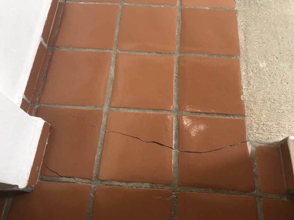 repair basement floor cracks