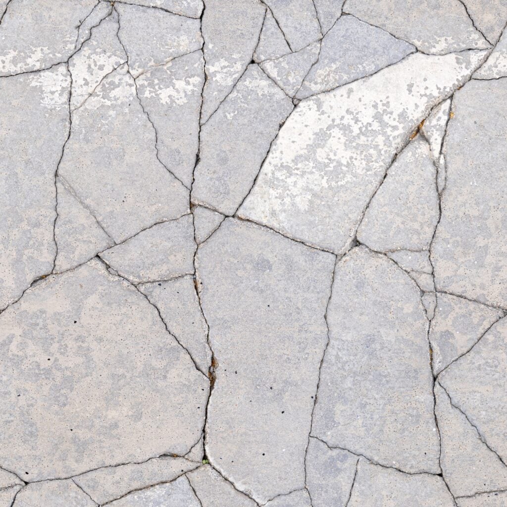 Cracked concrete slab with multiple intersecting foundation fractures