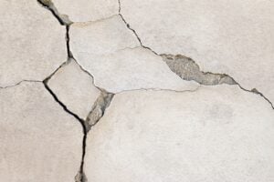 CrackX inspecting foundation cracks and explaining impact on home value