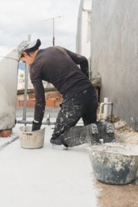CrackX worker applying professional waterproofing products