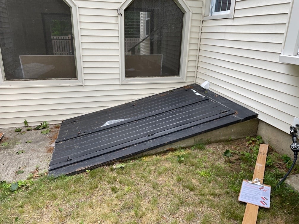 inspecting common bulkhead waterproofing mistakes in a residential basement