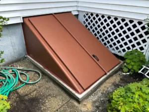 New brown basement bulkhead door installed by CrackX in Methuen, MA